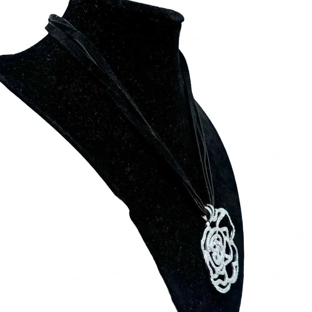 STERLING SILVER OPEN FLOWER PENDANT W MICRO PAVE STONES ON BLACK SUEDE NECKLACE